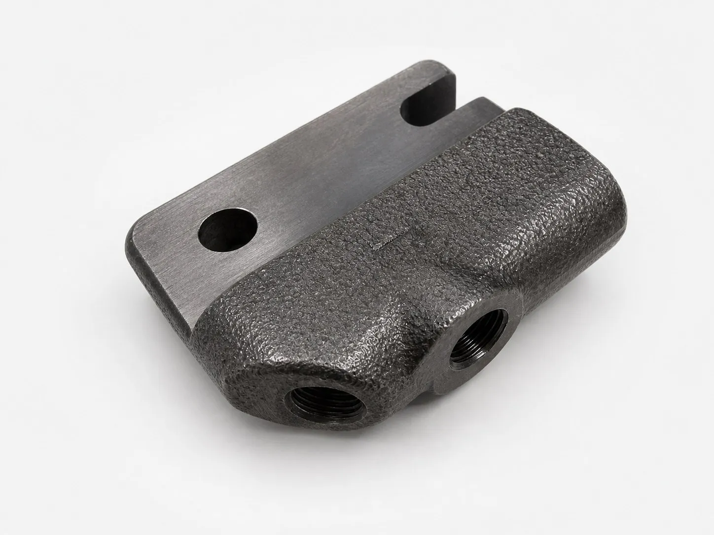 Forged and machined metal bracket with functional holes.